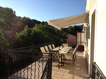 Balcony with table and chairs