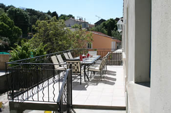 Balcony with table and chairs